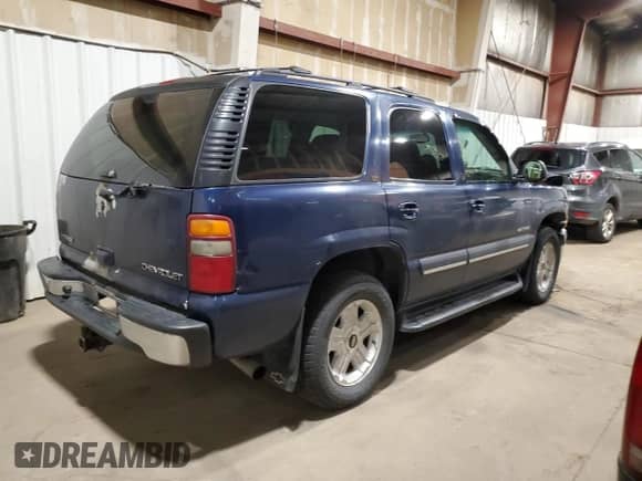 2003 Chevrolet Tahoe LT z VIN 1GNEK13Z33J204958, wystawiony jako Copart lot #86888695 z przebiegiem 136 986 mil mil oraz Szkoda całkowita • Salvage title. Historia ofert i sprzedaży dostępna na DreamBid. Obrazek 3.