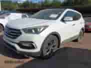 2018 Hyundai Santa Fe Ultimate с VIN 5NMZW4LA5JH082357, выставлен на аукционе IAAI как лот 43174913 с пробегом 154 318 миль миль и . История ставок и продаж доступна на DreamBid. Изображение 17.