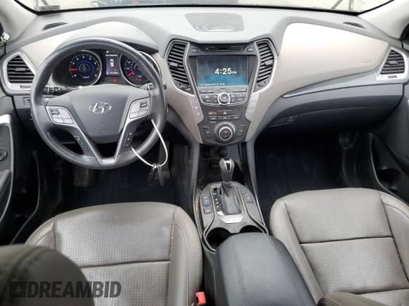 2015 Hyundai Santa Fe с VIN 5XYZWDLA5FG281443, выставлен на аукционе Copart как лот 71814725 с пробегом 211 306 миль миль и Списание • Salvage title. История ставок и продаж доступна на DreamBid. Изображение 8.