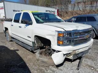 2014 Chevrolet Silverado 1500 High Country with VIN 3GCUKTEJ7EG372338, listed as a IAAI auction lot 41849096 with 69,010 mi miles and . Bid and sale history available at DreamBid. Image 1.