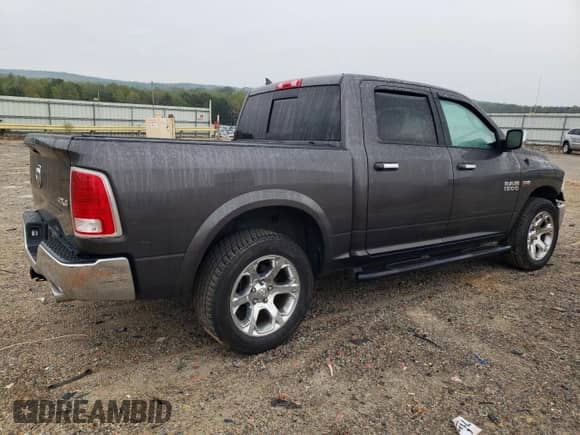 2017 Ram 1500 Laramie с VIN 1C6RR7NT4HS774011, выставлен на аукционе Copart как лот 84175115 с пробегом 74 711 миль миль и Списание • Salvage title. История ставок и продаж доступна на DreamBid. Изображение 3.