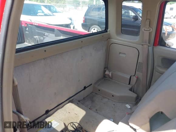 1999 Nissan Frontier XE with VIN 1N6DD26S9XC322264, listed as a IAAI auction lot 42867874 with 230,481 mi miles and . Bid and sale history available at DreamBid. Image 8.