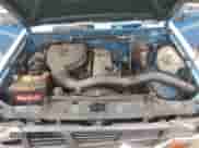 1996 Nissan Frontier XE z VIN 1N6SD16S0TC355813, wystawiony jako Copart lot #71358195 z przebiegiem 234 462 mil mil oraz Szkoda całkowita • Salvage title. Historia ofert i sprzedaży dostępna na DreamBid. Obrazek 11.