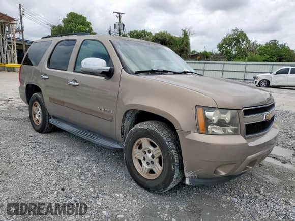 2007 Chevrolet Tahoe LS с VIN 1GNFC13C67R387728, выставлен на аукционе Copart как лот 62827105 с пробегом 163 140 миль миль и Списание • Salvage title. История ставок и продаж доступна на DreamBid. Изображение 4.