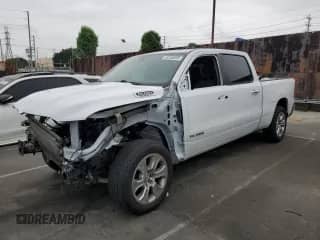 2020 Ram 1500 Big Horn with VIN 1C6SRFMTXLN264427, listed as a Copart auction lot 58765055 with 79,512 mi miles and Salvage title. Bid and sale history available at DreamBid. Image 1.