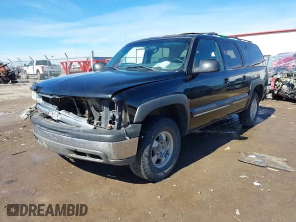 2002 Chevrolet Suburban Z71 with VIN 3GNFK16Z32G202949, listed as a IAAI auction lot 41637140 with 277,161 mi miles and . Bid and sale history available at DreamBid. Image 2.