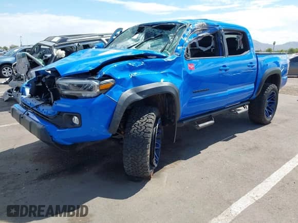 2021 Toyota Tacoma SR with VIN 3TMCZ5AN0MM377425, listed as a IAAI auction lot 43232397 with Not provided miles and . Bid and sale history available at DreamBid. Image 2.