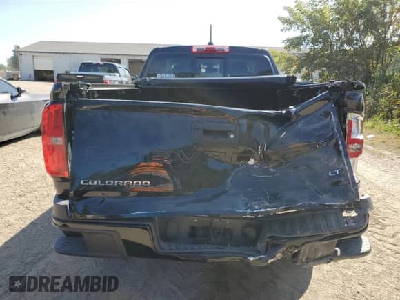 2021 Chevrolet Colorado 4WD LT z VIN 1GCHTCEA3M1157602, wystawiony jako Copart lot #80803935 z przebiegiem 32 854 mil mil oraz Czysty tytuł • Clean title. Historia ofert i sprzedaży dostępna na DreamBid. Obrazek 6.