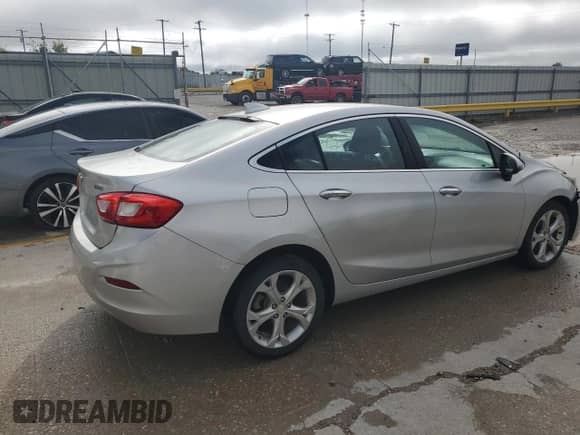 2017 Chevrolet Cruze Premier с VIN 1G1BF5SM0H7157009, выставлен на аукционе Copart как лот 83812355 с пробегом 216 415 миль миль и Списание • Salvage title. История ставок и продаж доступна на DreamBid. Изображение 3.