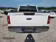 2023 Ford F-150 Lariat with VIN 1FTFW1E89PFA91516, listed as a Copart auction lot 61666315 with 65,711 mi miles and Salvage title. Bid and sale history available at DreamBid. Image 6.