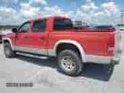 2001 Dodge Dakota Sport with VIN 1B7GG2AN71S195536, listed as a Copart auction lot 66399315 with 275,707 mi miles and Salvage title. Bid and sale history available at DreamBid. Image 2.