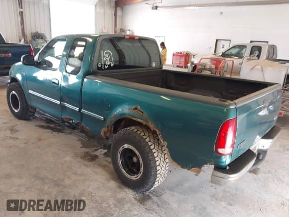 1997 Ford F-150 z VIN 1FTDX1766VNA16744, wystawiony jako IAAI lot #42578246 z przebiegiem 129 699 mil mil oraz . Historia ofert i sprzedaży dostępna na DreamBid. Obrazek 3.