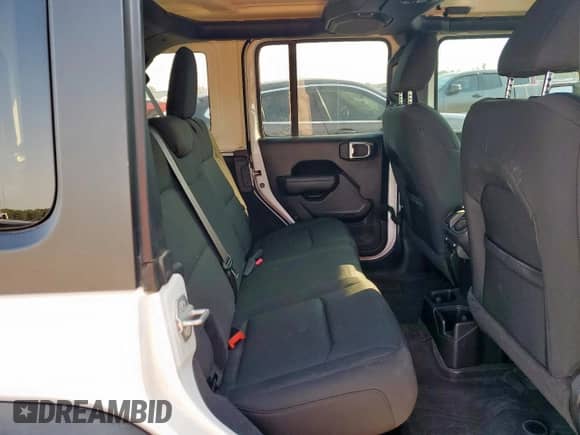 2023 Jeep Wrangler Sport S с VIN 1C4HJXDG1PW520182, выставлен на аукционе Copart как лот 71430685 с пробегом 33 454 миль миль и Списание • Salvage title. История ставок и продаж доступна на DreamBid. Изображение 11.