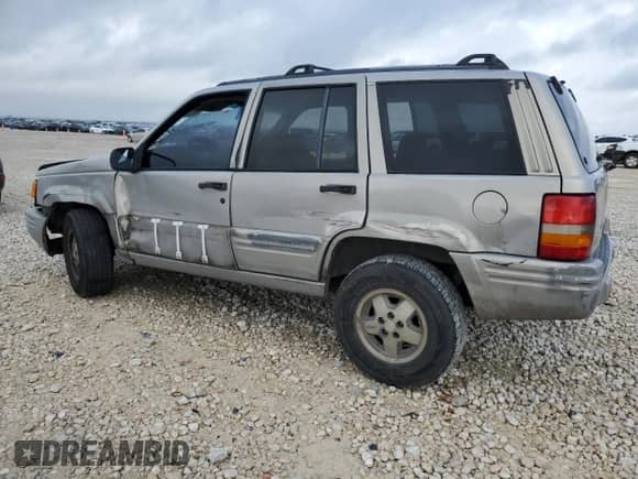 1998 Jeep Grand Cherokee with VIN 1J4FX48S6WC345358, listed as a Copart auction lot 85057454 with Not provided miles and Salvage title. Bid and sale history available at DreamBid. Image 2.