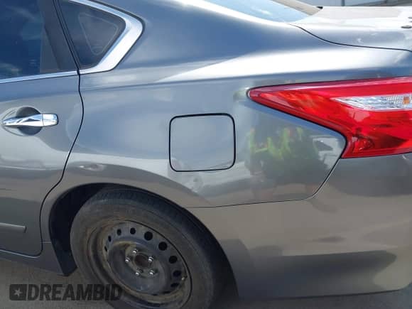 2016 Nissan Altima S z VIN 1N4AL3AP7GC189673, wystawiony jako IAAI lot #43172328 z przebiegiem 157 544 mil mil oraz . Historia ofert i sprzedaży dostępna na DreamBid. Obrazek 13.