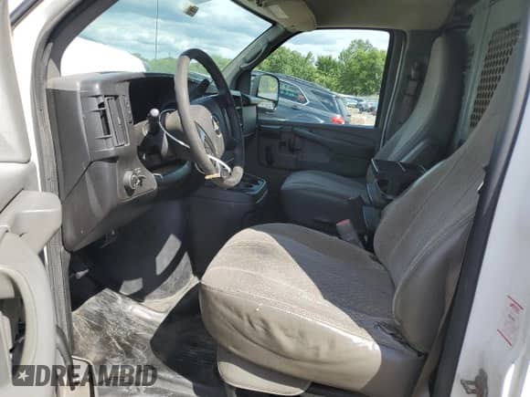 2013 Chevrolet Express Cargo with VIN 1GCWGFCA6D1143242, listed as a Copart auction lot 70320265 with 330,928 mi miles and Salvage title. Bid and sale history available at DreamBid. Image 7.