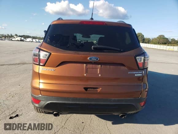 2017 Ford Escape Titanium с VIN 1FMCU0JD6HUC31343, выставлен на аукционе Copart как лот 82177015 с пробегом 173 075 миль миль и Чистый • Clean title. История ставок и продаж доступна на DreamBid. Изображение 6.