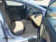 2013 Hyundai Elantra GLS z VIN KMHDH4AE7DU491513, wystawiony jako IAAI lot #43152400 z przebiegiem 96 484 mil mil oraz . Historia ofert i sprzedaży dostępna na DreamBid. Obrazek 5.