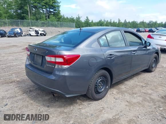 2019 Subaru Impreza with VIN 4S3GKAA61K3622805, listed as a IAAI auction lot 42694206 with 54,014 mi miles and . Bid and sale history available at DreamBid. Image 4.