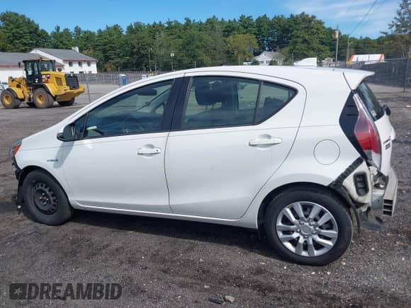 2015 Toyota Prius One z VIN JTDKDTB37F1102338, wystawiony jako IAAI lot #43160997 z przebiegiem 105 779 mil mil oraz . Historia ofert i sprzedaży dostępna na DreamBid. Obrazek 14.