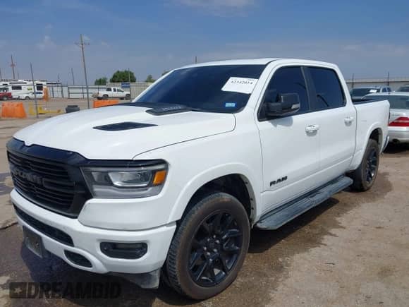 2021 Ram 1500 Laramie with VIN 1C6SRFJT9MN517369, listed as a IAAI auction lot 42342014 with 89,649 mi miles and . Bid and sale history available at DreamBid. Image 17.