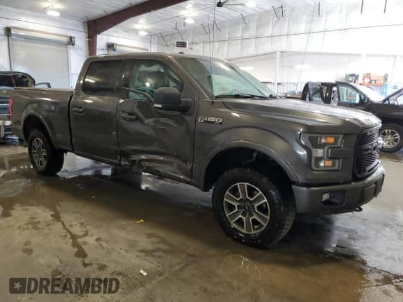 2015 Ford F-150 XLT with VIN 1FTFW1EF8FKE92818, listed as a Copart auction lot 82355495 with 160,213 mi miles and Salvage title. Bid and sale history available at DreamBid. Image 4.
