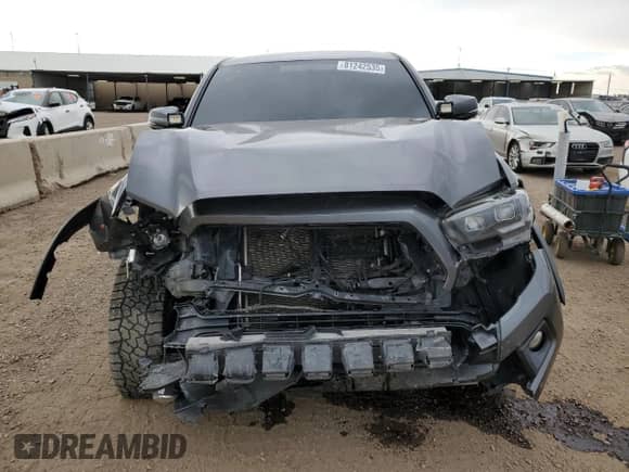 2017 Toyota Tacoma SR5 z VIN 3TMCZ5AN9HM104442, wystawiony jako Copart lot #81242535 z przebiegiem 95 090 mil mil oraz Szkoda całkowita • Salvage title. Historia ofert i sprzedaży dostępna na DreamBid. Obrazek 5.