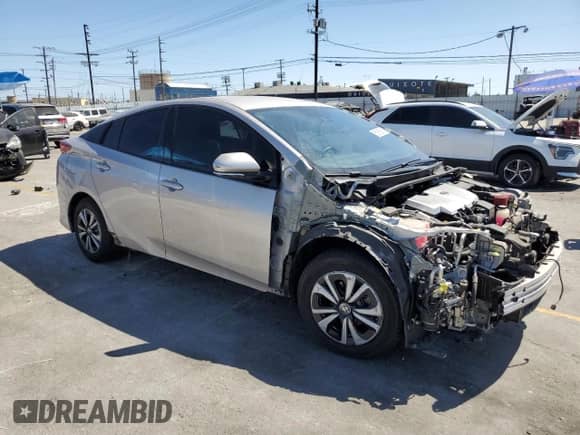 2018 Toyota Prius Plus z VIN JTDKARFP7J3099284, wystawiony jako Copart lot #58186915 z przebiegiem 51 694 mil mil oraz Szkoda całkowita • Salvage title. Historia ofert i sprzedaży dostępna na DreamBid. Obrazek 4.