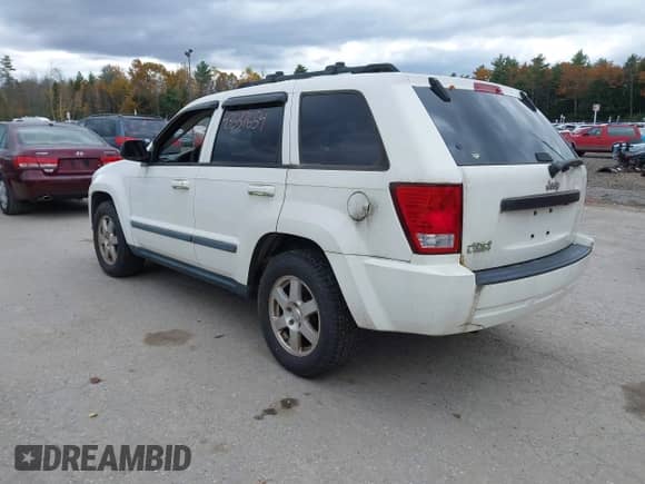 2009 Jeep Grand Cherokee Laredo with VIN 1J8GR48K89C526849, listed as a IAAI auction lot 43537654 with 214,796 mi miles and . Bid and sale history available at DreamBid. Image 3.