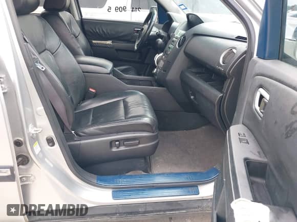 2010 Honda Pilot Touring with VIN 5FNYF3H94AB022723, listed as a IAAI auction lot 42378211 with 326,338 mi miles and . Bid and sale history available at DreamBid. Image 5.