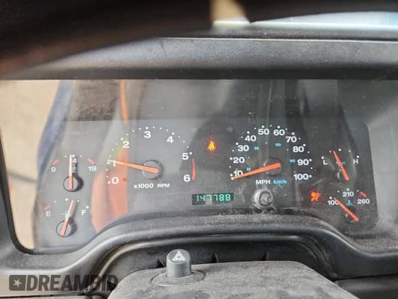 2003 Jeep Wrangler X z VIN 1J4FA39S33P356428, wystawiony jako Copart lot #70285135 z przebiegiem 147 788 mil mil oraz Szkoda całkowita • Salvage title. Historia ofert i sprzedaży dostępna na DreamBid. Obrazek 9.