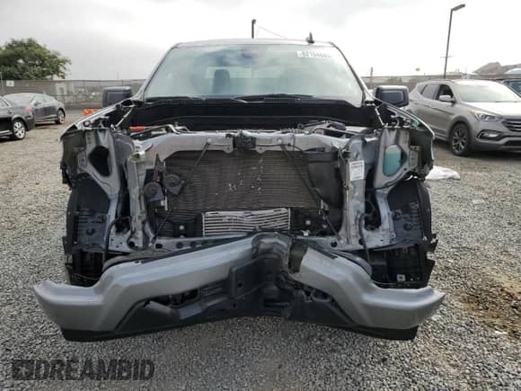2024 Chevrolet Silverado 1500 Custom with VIN 3GCPABEK2RG394255, listed as a Copart auction lot 82154585 with 8,465 mi miles and Salvage title. Bid and sale history available at DreamBid. Image 5.