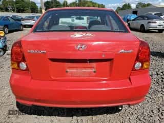 2003 Hyundai Accent GL with VIN KMHCG45C83U484138, listed as a Copart auction lot 72008754 with 25,615 mi miles and Salvage title. Bid and sale history available at DreamBid. Image 6.