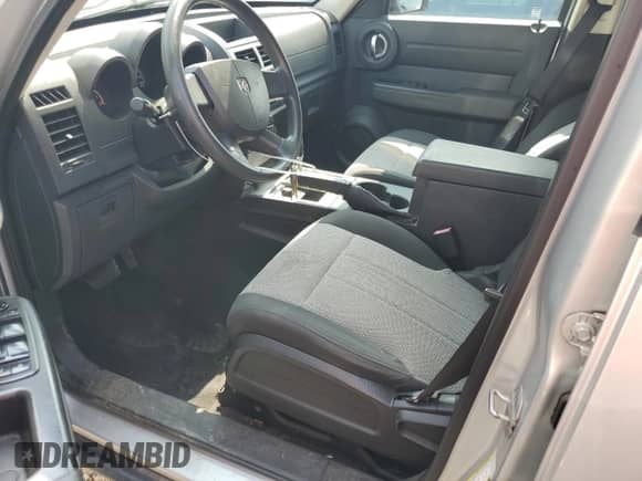2009 Dodge Nitro SE with VIN 1D8GU28K49W541908, listed as a Copart auction lot 55815125 with 101,710 mi miles and Salvage title. Bid and sale history available at DreamBid. Image 7.