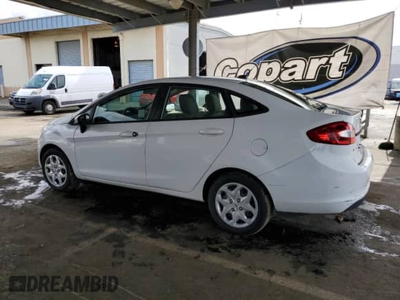 2012 Ford Fiesta SE with VIN 3FADP4BJ7CM140838, listed as a Copart auction lot 85192795 with 95,472 mi miles and Clean title. Bid and sale history available at DreamBid. Image 2.