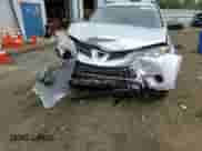 2015 Toyota RAV4 LE with VIN JTMBFREVXFD174305, listed as a Copart auction lot 84173005 with 119,695 mi miles and Salvage title. Bid and sale history available at DreamBid. Image 14.