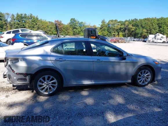 2023 Toyota Camry LE z VIN 4T1C11AK8PU757761, wystawiony jako IAAI lot #43340611 z przebiegiem 28 919 mil mil oraz . Historia ofert i sprzedaży dostępna na DreamBid. Obrazek 13.