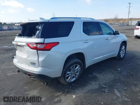 2021 Chevrolet Traverse High Country z VIN 1GNEVNKW9MJ200257, wystawiony jako IAAI lot #41545240 z przebiegiem 72 842 mil mil oraz . Historia ofert i sprzedaży dostępna na DreamBid. Obrazek 4.