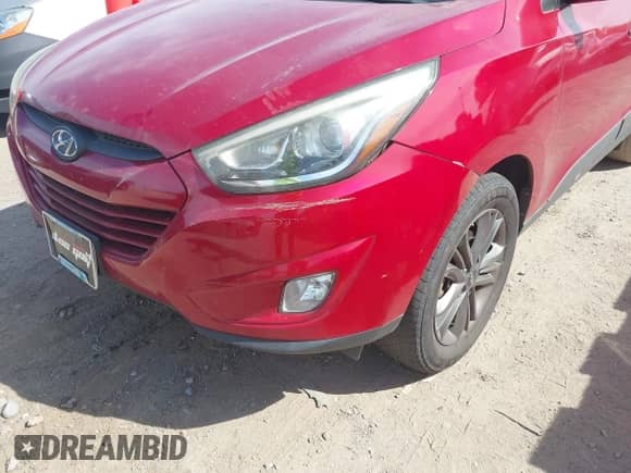 2015 Hyundai Tucson SE with VIN KM8JU3AGXFU049497, listed as a IAAI auction lot 43103818 with 125,628 mi miles and . Bid and sale history available at DreamBid. Image 6.