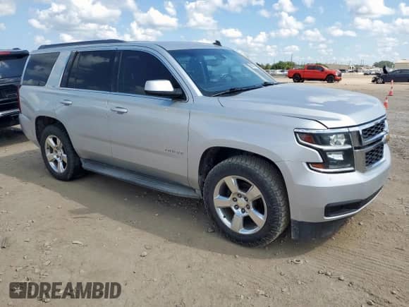 2015 Chevrolet Tahoe LS с VIN 1GNSCAKC0FR276185, выставлен на аукционе Copart как лот 81661645 с пробегом 233 886 миль миль и Чистый • Clean title. История ставок и продаж доступна на DreamBid. Изображение 4.