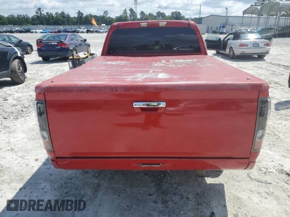 2009 Chevrolet Colorado Work Truck with VIN 1GCCS199598119630, listed as a Copart auction lot 60614335 with 151,512 mi miles and Clean title. Bid and sale history available at DreamBid. Image 6.
