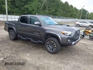 2023 Toyota Tacoma SR with VIN 3TYCZ5AN7PT109786, listed as a IAAI auction lot 42926073 with 51,321 mi miles and . Bid and sale history available at DreamBid. Image 1.
