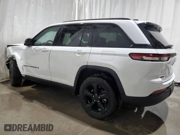 2023 Jeep Grand Cherokee Altitude with VIN 1C4RJHAG8PC544186, listed as a Copart auction lot 80485515 with 111,139 mi miles and Clean title. Bid and sale history available at DreamBid. Image 2.