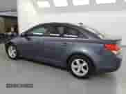 2014 Chevrolet Cruze 1LT with VIN 1G1PC5SB9E7270031, listed as a Copart auction lot 68560915 with 104,943 mi miles and Clean title. Bid and sale history available at DreamBid. Image 2.