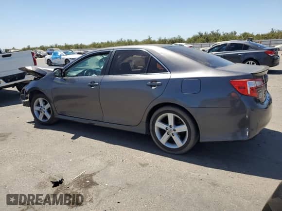 2014 Toyota Camry L with VIN 4T1BF1FK0EU379616, listed as a Copart auction lot 69282625 with 231,177 mi miles and Salvage title. Bid and sale history available at DreamBid. Image 2.