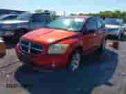 2010 Dodge Caliber Mainstreet with VIN 1B3CB3HAXAD581024, listed as a IAAI auction lot 43167115 with 188,315 mi miles and . Bid and sale history available at DreamBid. Image 2.