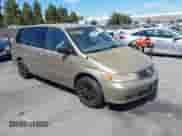 2002 Honda Odyssey LX with VIN 2HKRL18562H545307, listed as a IAAI auction lot 43059547 with 258,206 mi miles and . Bid and sale history available at DreamBid. Image 1.