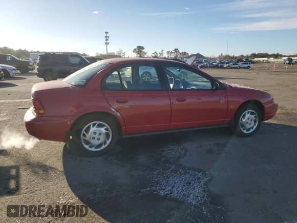 1997 Saturn SL с VIN 1G8ZK5279VZ389386, выставлен на аукционе Copart как лот 41429015 с пробегом 104 764 миль миль и На запчасти • Non repairable. История ставок и продаж доступна на DreamBid. Изображение 3.