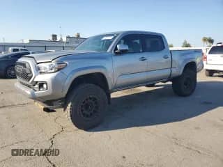 2018 Toyota Tacoma SR5 with VIN 3TMDZ5BN4JM043235, listed as a Copart auction lot 83832045 with 46,451 mi miles and Salvage title. Bid and sale history available at DreamBid. Image 1.