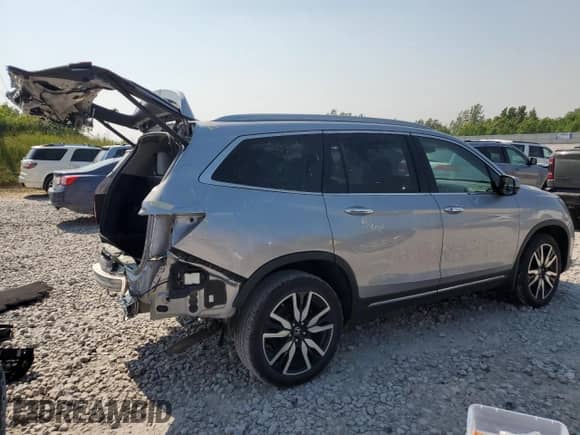 2021 Honda Pilot Touring 7-Passenger z VIN 5FNYF6H63MB025849, wystawiony jako Copart lot #60432205 z przebiegiem 78 277 mil mil oraz Czysty tytuł • Clean title. Historia ofert i sprzedaży dostępna na DreamBid. Obrazek 3.